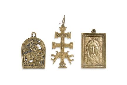 Set of three gilded bronze crucifixes: one is a Ca