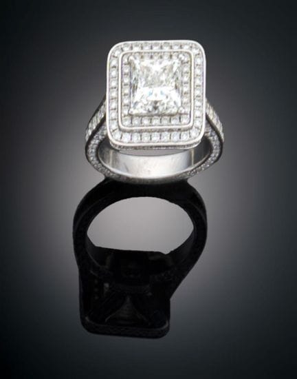 RING WITH A NATURAL PRINCESS-CUT DIAMOND 
Set in p