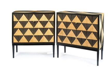 A pair of Art Deco-style chests of drawers made of