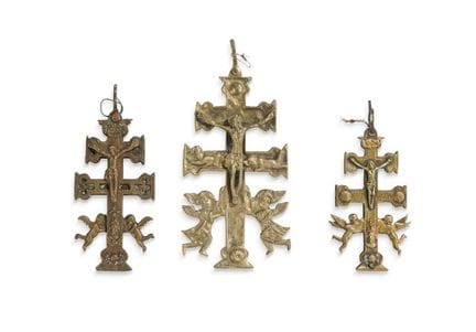 Set of three Caravaca crosses in gilded bronze. 
M