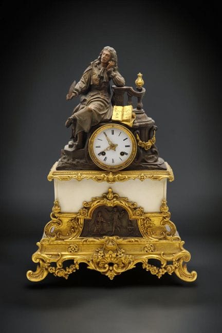 Pendeluhr aus patinierter und vergoldeter Bronze u