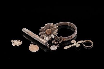 MELLERIO
Brosche „Margerite“ aus 925er Silber, tei