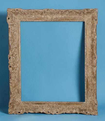 Large 18th-century carved wooden frame, traces of 
