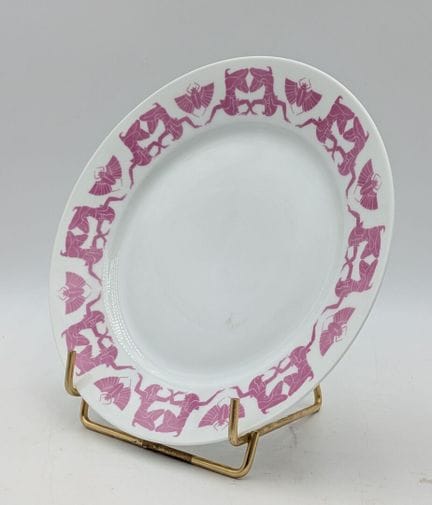 SEVRES. Piatto in porcellana, con il bordo decorat