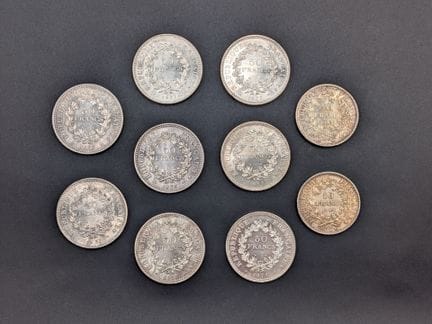 Set composto da 2 monete da 10 franchi e 8 monete 