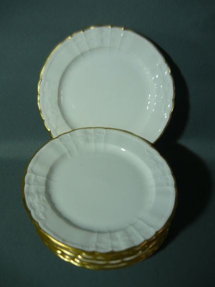 KPM Berlin Rocaille White with Gold. 7 flat plates