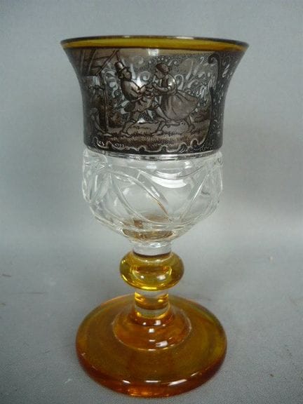 Footed glass. Yellow overglaze. Black enamel paint