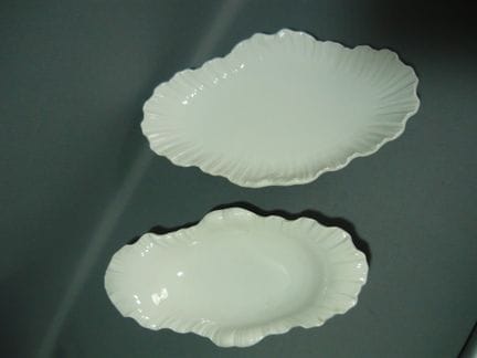 KPM Berlin. Large and small Rococo-style bowls. Fi