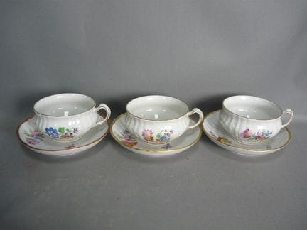 Three large teacups. KPM Berlin. 20th century. Fir
