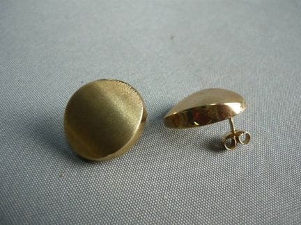 Pair of large, modern stud earrings. Tested to 585