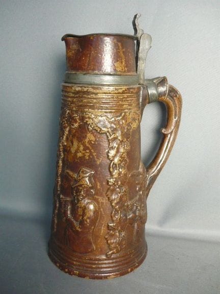 Large wine jug. Glazed ceramic. Pewter lid. Probab