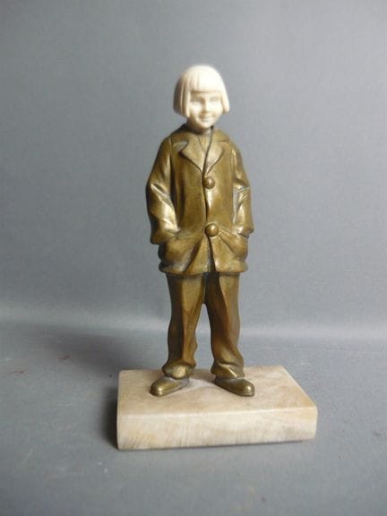 Sculpture from around 1920. Cheeky Girl. Bronze on