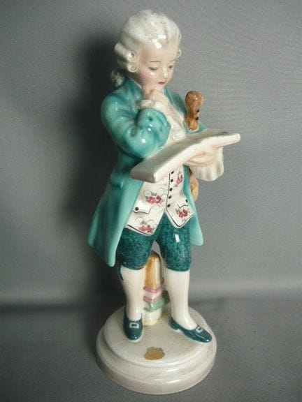 Young Mozart with a sheet of music. Goldscheider, 