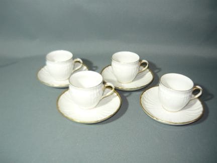 KPM Berlin. Rocaille with gold trim. 4 mocha cups 