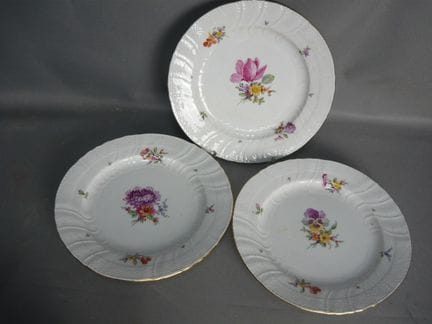 Three flat plates. KPM Berlin. 20th century. First