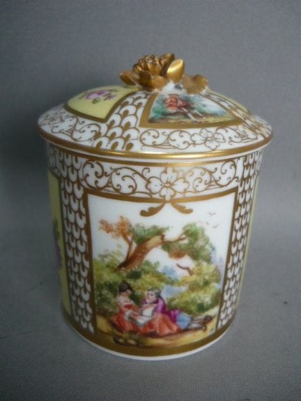 Delicate lidded jar with Rococo scenes. Potschappe
