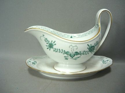 Saucer with a tall handle. Meissen (Schwerter). "I