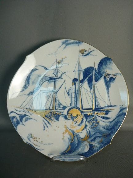 Wall plate featuring a steam-powered sailboat. Mei