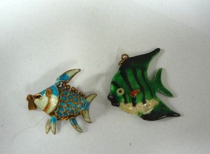 Two pendants. Fish. Enameled. One stamped "Silver.
