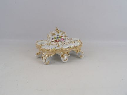 In the Parisian style, a porcelain inkwell with a 