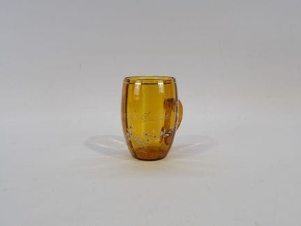 SOUVENIR, Tasse aus orangefarbenem Glas mit emaill