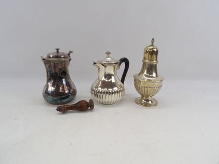 A silver plated metal set including 2 pitchers wit