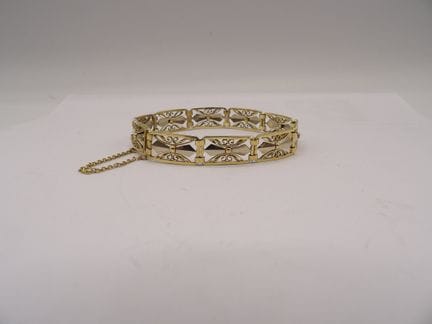 Bracciale in oro bicolore 18 carati con maglie tra