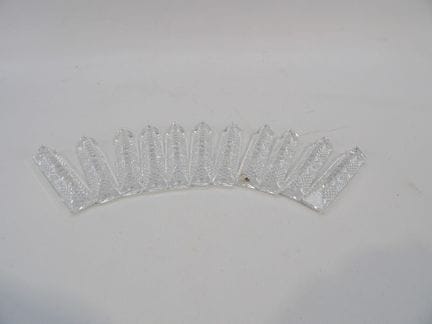 BACCARAT, Folge von 11 Messerhaltern in Dreiecksfo