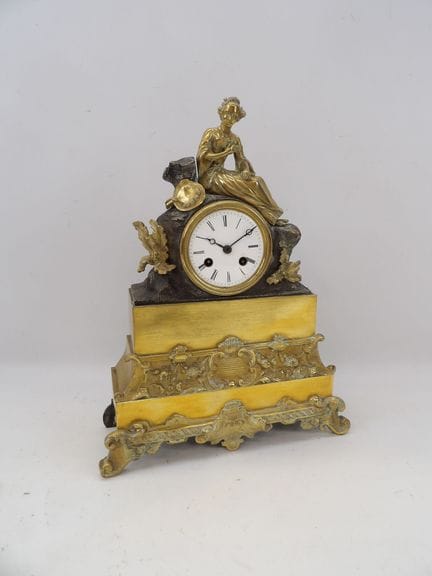 Bronze mantel clock with two patinas and brass det