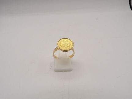 Bague chevalière en or jaune 18K et pièce pesos or