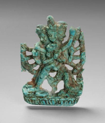 Figurine en turquoise sculptée représentant Yab-Yu