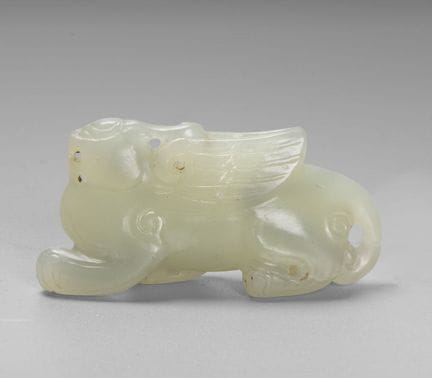Figurine en jade sculptée représentant un animal m