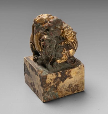 Un rare sceau en bronze doré représentant un qilin
