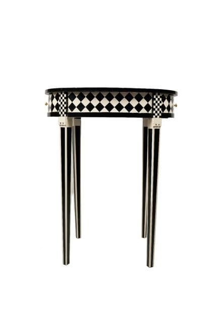 Designer side table. Made of carved and polychrome