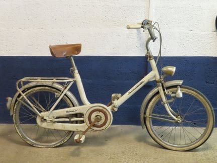 MOTOCONFORT. Folding bicycle with a white frame. R