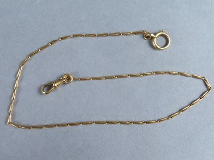 Cadena de reloj de oro amarillo (750‰), con eslabo