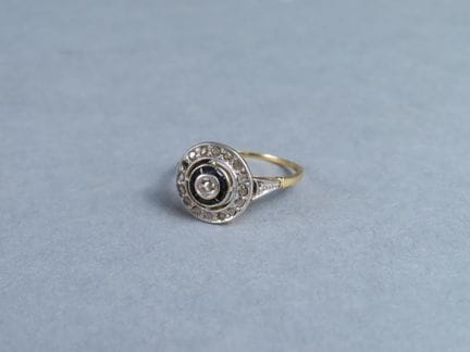 Bague Art Déco en or jaune et blanc (750/00 - tête