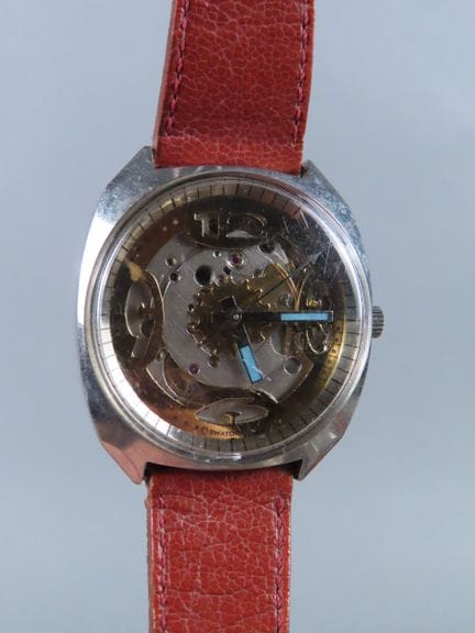 SWATCH, Switzerland. Wristwatch with a tonneau-sha