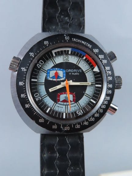 ORDRIVE. Chronograph, tonneau-shaped stainless ste