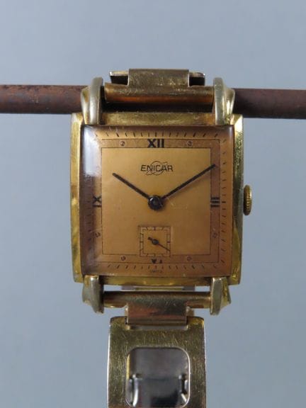 ENICAR, Switzerland. Wristwatch with a square gold