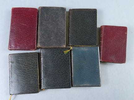 A set of 7 miniature books, leather-bound (late 19