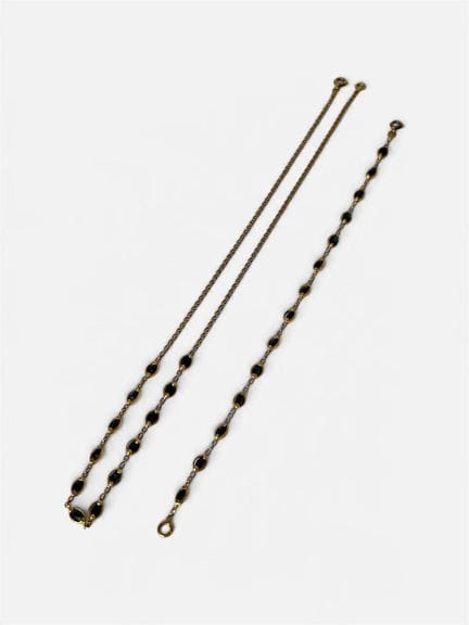 Parure 
Collier en or jaune 750/°° (18cts) serti d