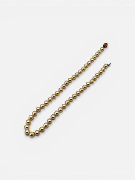 Collier de perles avec un fermoir boule en or  750