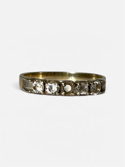 Bague en or gris 750/°° (18 cts) orné de 4 brillan