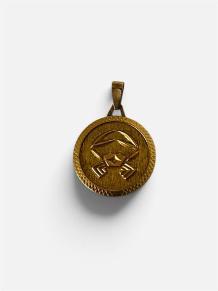 Médaille zodiacale en or jaune 750/°° (18 cts)
Poi