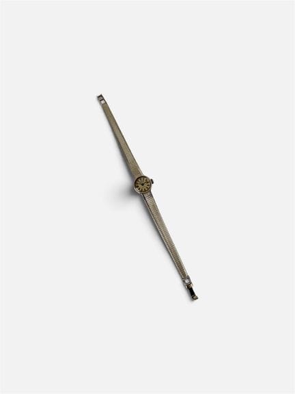 GERKA
Montre de dame en or gris 750/°° (18cts). Ca