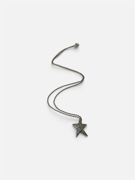 Pendentif étoile en or gris 750/°° (18 cts) serti 