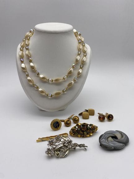 Set di gioielli vintage in metallo dorato e metall