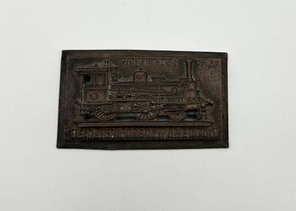 Allemagne - Relief en bronze figurant un train à v