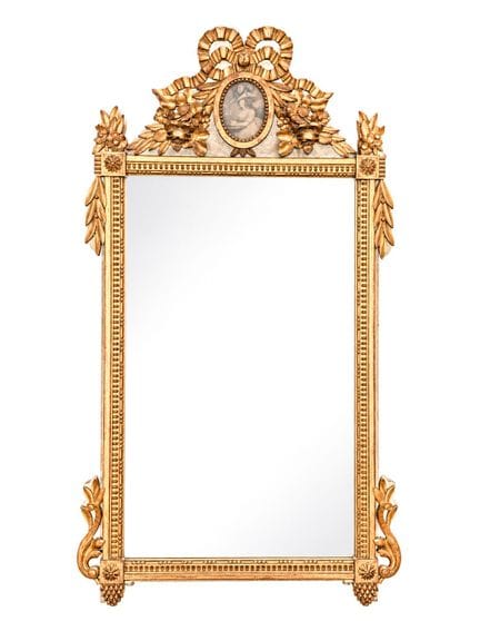 Important miroir en bois stuqué et doré, les monta